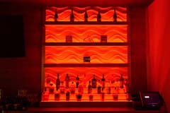 Banquet hall bar with red LED controllable lighting by Paramount Construction and Contracting