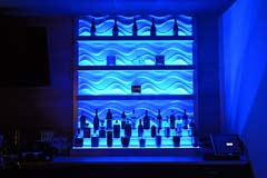 Banquet hall bar with blue LED controllable lighting by Paramount Construction and Contracting