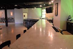 Banquet hall bar with quartz granit bar by Paramount Construction and Contracting
