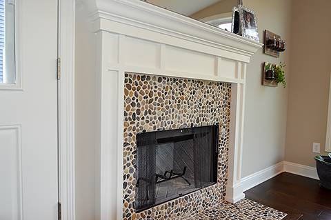 Fireplace with beautiful molding and stonework