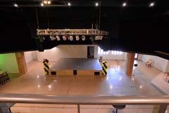 Banquet hall entertainment center stage and lighting by Paramount Construction and Contracting